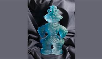 Modern Japanese bluish glass sculpture with a design based on ancient form.