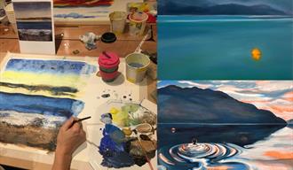 Photo of a person painting a seascape