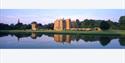 reflections of broughton castle at dusk