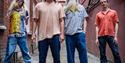 Reef - four men in alleyway look at the camera