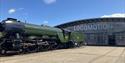 Locomotive outside of Locomotion's Collection Building