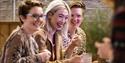 Three people laughing