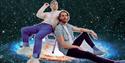 The Hoosiers, two men recline in front of a star backdrop