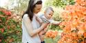 mother and baby looking at the gardens