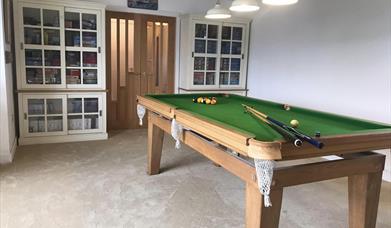 A Ground Floor room, with level access and seating for six.