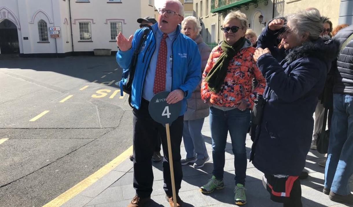 Wild Mann Tours guiding cruise ship visitors in Castletown.