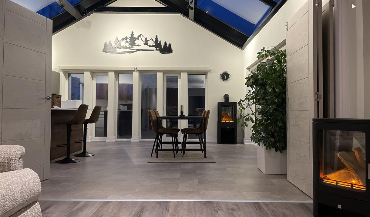 Tri-folding doors lead in to the large kitchen diner