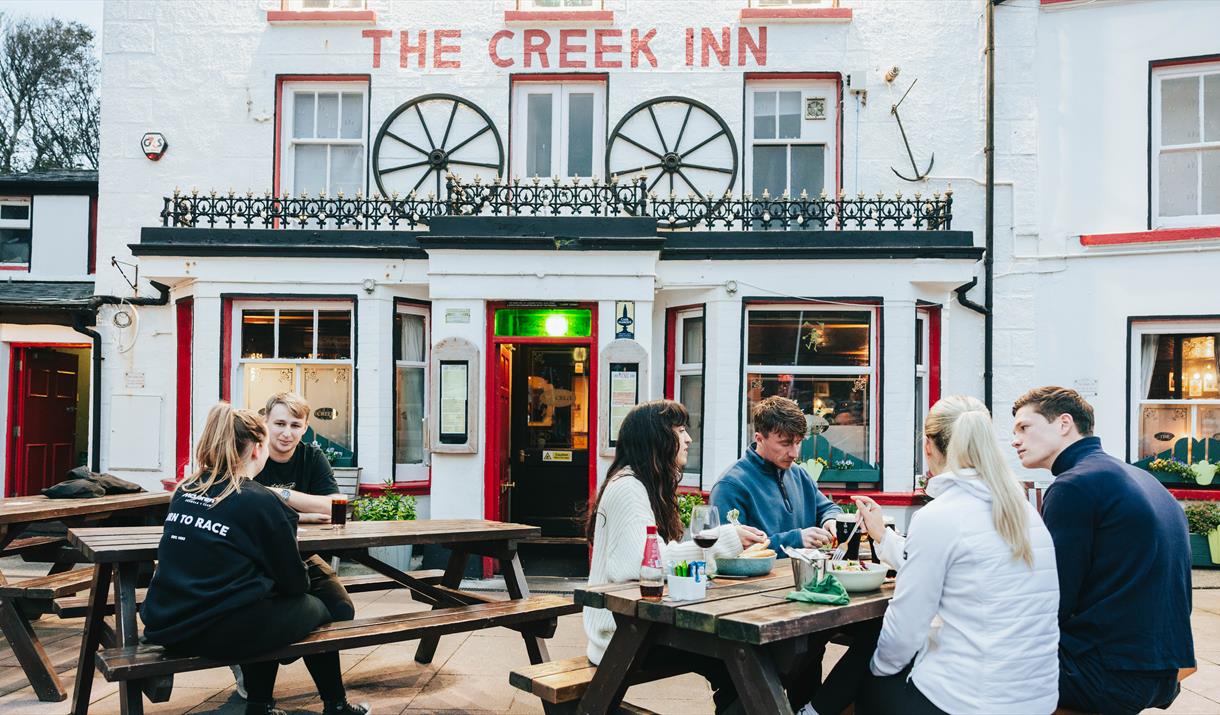 Outdoor dining in front of pub