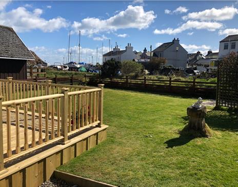 Outside view looking across the garden to the harbour