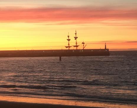 Admire the magnificent sunsets from the  comfy cottage windows…
