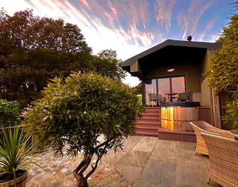 Front of property showing hot tub