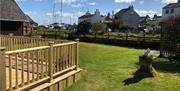 Outside view looking across the garden to the harbour