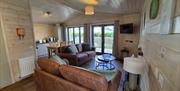 Single level property. Open plan living, dining and kitchen area with hard wood floors.