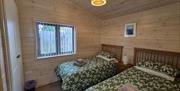 Single level property. Bedrooms have thin carpet.