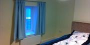 Twin bedroom at Bay View Cottage - sea view