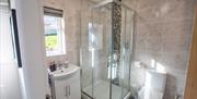 Family bathroom, walk in shower and separate bath. Luxury toiletries.
