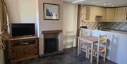 Living room towards kitchen area