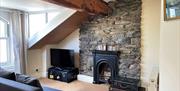 A cosy open-plan family area on top floor