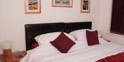 Ground Floor Bedroom - configured as a Double room (super king size bed shown) - can be set up as a twin room.