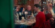 Friends Enjoying Dinner at Vibe