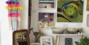 A colourful mix of ceramics, wool creations, and paintings at Pink Seaweed — showcasing art in every medium, for every taste and every budget