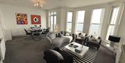 Douglas boutique holiday apartment with a spacious lounge and dining room facing the sea