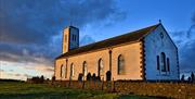 Sunset at Jurby Church  ©  Peter Killey