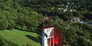 View overlooking the Great Laxey Wheel, Laxey Village and the sea