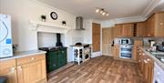 The main kitchen has everything you need to prepare a decent meal for your family.
