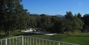 View of Snaefell above the treeline - view from 1st Floor Balcony - accessible from 1st Floor Rear Twin bedroom, or external stairs.