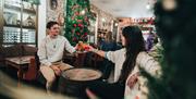 Couple enjoying drinks