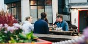 Outdoor dining in front of pub