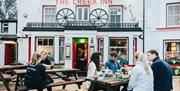 Outdoor dining in front of pub