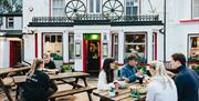 Outdoor dining in front of pub