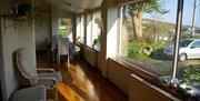 Breakfast room with a view over the Laxey valley. Parking spot opposite the house.