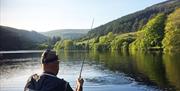 Landing a fish at West Baldwin. Photo courtesy of Geoff Thomas.