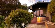 Front of property showing hot tub