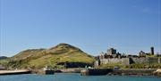 The imposing ruins of Peel Castle and Cathedral with Peel Hill behind.