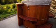 Cedar Hot Tub with open view of gardens.
