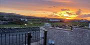 House gate at sunrise