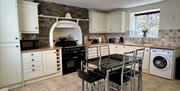 The perfectly equipped kitchen at Bay View Cottage - with sea view too!