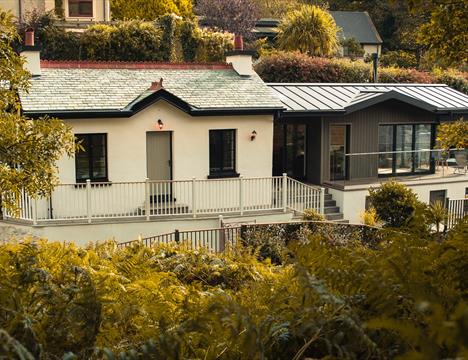 Stunning Coastal retreat only 8 miles from Douglas. Providing 2 boutique ensuite bedrooms, available as twins or king bed configurations. Luxurious cedar hot tub overlooking fabulous views of Laxey bay, harbour & river.