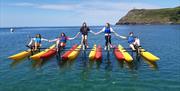 Aquabike isle of man group teenagers on up and rec chiliboats port erin clear calm sea