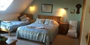 Snowdrop is popular as our family room. It can be a double, twin, family room with one or two extra beds in. There is a comfortable sitting area in th