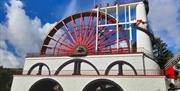 Lady Isabella painted in white and red found in Laxey, the largest working water wheel in the world