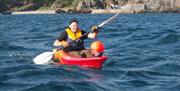 Single and double kayaks for hire on an hourly basis in Port Erin Bay