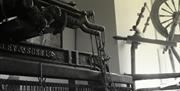 Photo of the 1926 Hattersley Pedal Loom still used today to weave all our scarves and single width cloth