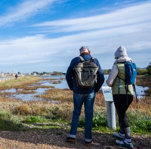 Couple exploring the Isle of Wight on foot
