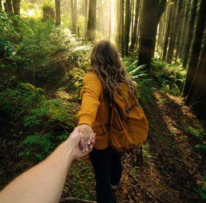 Couple exploring the woods on the Isle of Wight