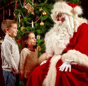 Two children meeting Father Christmas at Osborne House, Isle of Wight